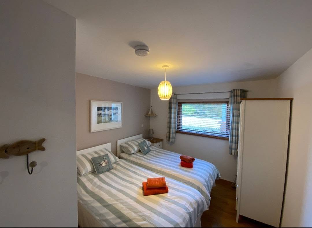 Spotlessly clean holiday let bedroom prepared by Shine Over Cleaning
